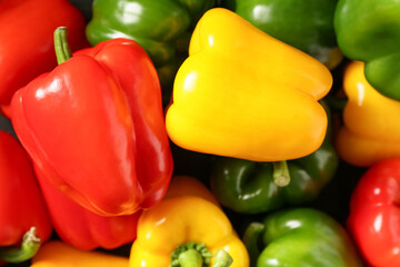 Texture of fresh colorful bell peppers, closeup