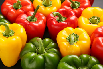 Texture of fresh colorful bell peppers, closeup