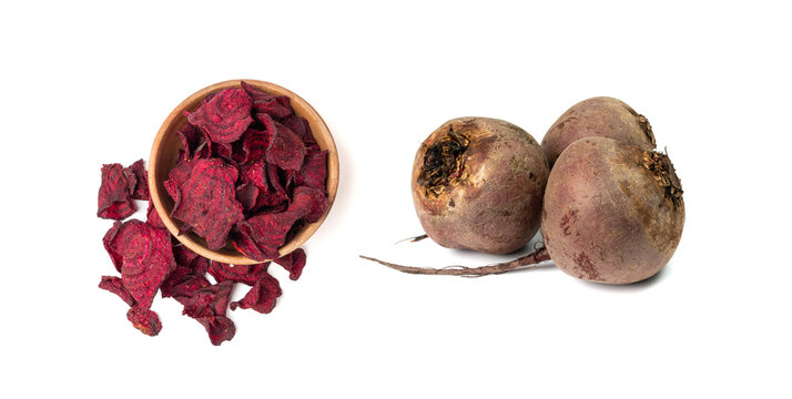 Dry beetroot chips isolated, dried sliced red beet flakes pile, beet root pieces and chips