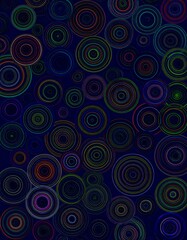 Fototapeta premium Colorful abstract circles on a dark background.