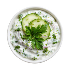 Creamy yogurt dip with cucumber onion and parsley on transparent background