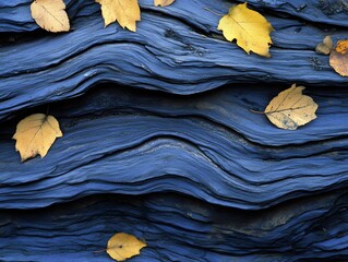Autumn Leaves on Blue Wavy Rock Texture