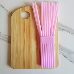 Pink Straws Bundle on Wooden Cutting Board