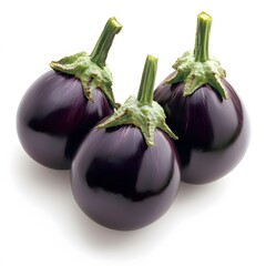 Three fresh purple eggplants with green stems on a white background studio shot