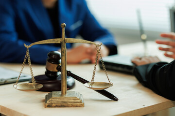 A lawyer and a client collaborate to ensure fairness.