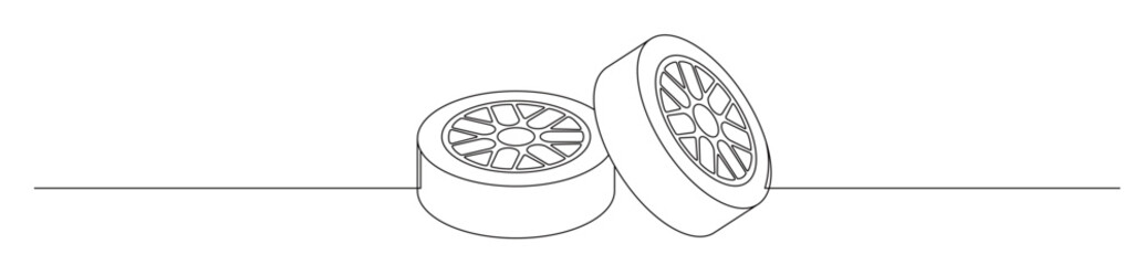 Line art of two car tires and rims stacked and lined up with a transparent background. automotive enthusiast concept © mamat