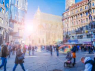 Obraz premium Crowd of anonymous people walking on busy city street 