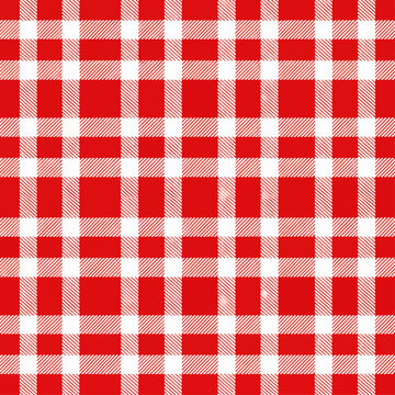 Seamless red and white gingham checkered tablecloth texture background featuring a classic picnic plaid fabric pattern in cotton textile material for a square linen backdrop design