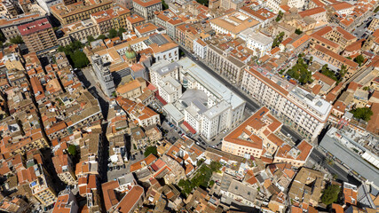 Fototapeta premium Aerial view of the historic Post Office building in Palermo, Sicily, Italy. It is located on Roma Street, one of the main streets in the city's historic center.