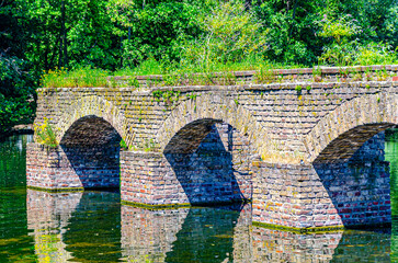 Old stone bridge with arches 