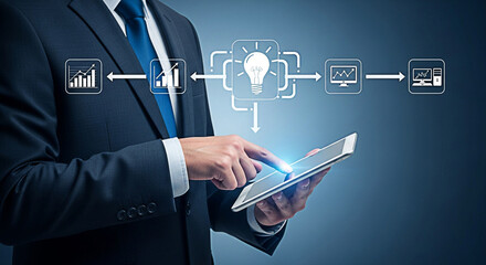 Businessman using tablet for data analysis and innovative solutions in the digital age