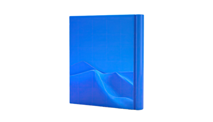 A blue textured book standing with a digital landscape design on its face