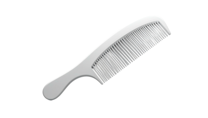 A white plastic comb, lying diagonally, against a stark black background