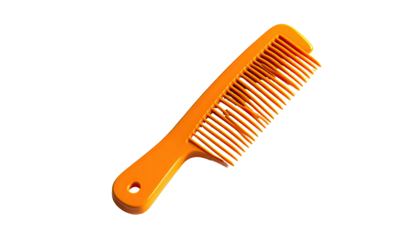 Orange plastic comb on a black background, well-lit, highlighting teeth
