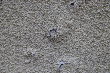 Processed collage of grey cracked stucco wall texture. Background for banner, backdrop or texture for 3D mapping