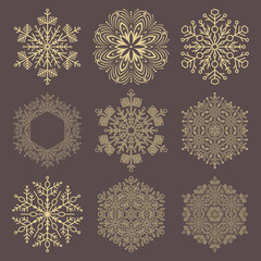 Set of golden snowflakes. Collection of winter ornaments. Snowflakes collection. Snowflakes for backgrounds and designs
