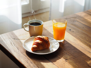 Breakfast with coffee, croissant and orange juice