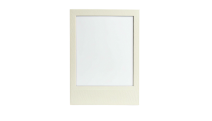 A classic instant photograph frame, cream-colored, with a blank white center