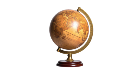 Vintage, illuminated globe in a darkened setting, highlighting continents