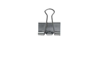 Silver metal binder clip, centered against a stark black background