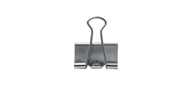 Silver metal binder clip, centered against a stark black background