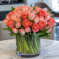 Stunning Coral Roses and Tulips Bouquet in Glass Vase