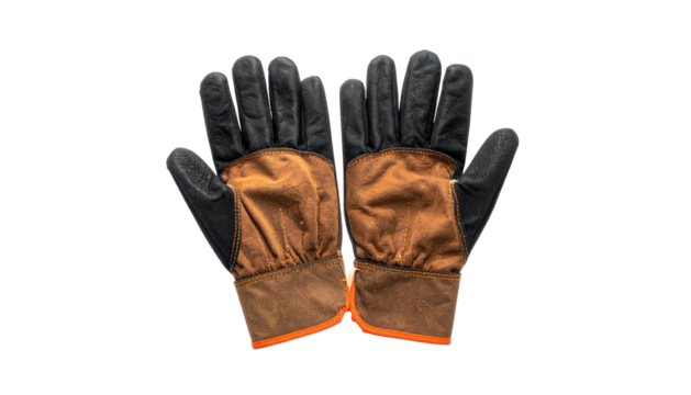 Pair of worn work gloves with black and tan panels, orange trim, on black