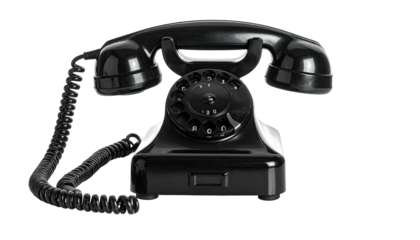 Close-up of a classic black rotary dial telephone on a transparent backdrop