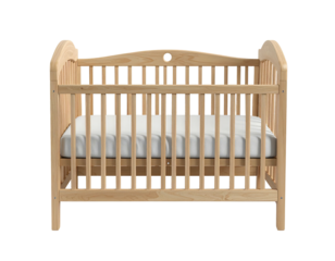 A light-wood baby crib with white mattress and vertical bars, isolated