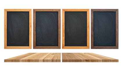 Four empty chalkboards with varying wood frames, above a wooden surface