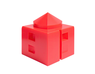 A vibrant red, geometric toy block shaped like a building with windows and a roof