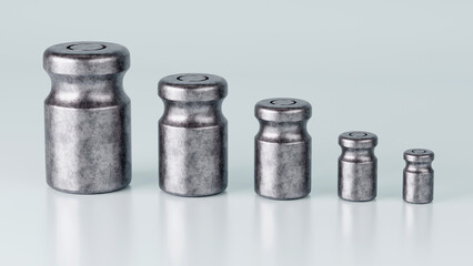 3D rendering of different size of metal calibration weight on color background © Suttiwan
