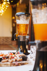 Refreshing beverage station with snacks at a vibrant outdoor gathering