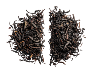 Two halves of dried, dark-colored leaves arranged in a rounded shape