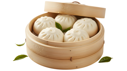 Bamboo steamer filled with hot, fluffy bao buns and leaves
