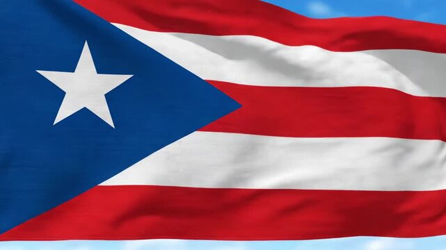 A vibrant flag, characterized by its bold blue triangular field containing a single white star, and alternating horizontal stripes of bright red and pure white, proudly flutters against a clear, sunny