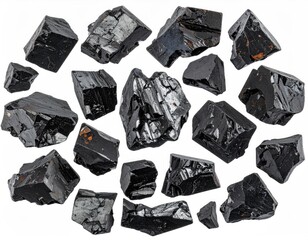 Naklejka premium Shiny black mineral chunks, rough edges, scattered light