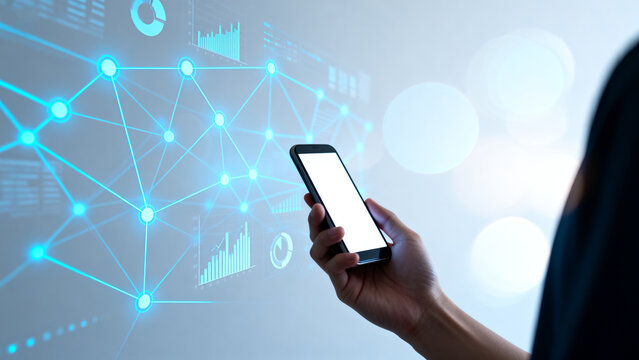 Person holding smartphone with digital network overlay