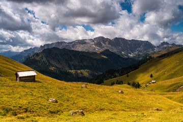 Scenic Mountain Landscape in the Dolomites, Italy.
Alpine Meadow with Peaks and mountain hut and pasture