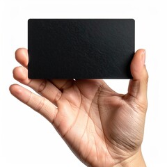 Hand holding textured black card against white