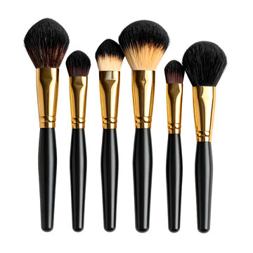 Seven makeup brushes with black handles, gold ferules, and varying brush heads, arranged in a row