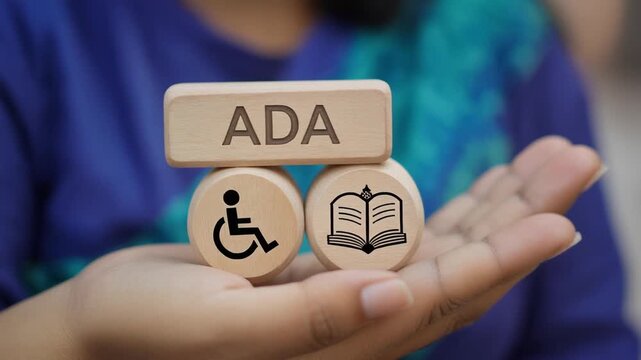 Business man working on virtual touch screen presses abbreviation: ADA. ADA Americans with Disabilities Act concept. Disability Law Social Services.video