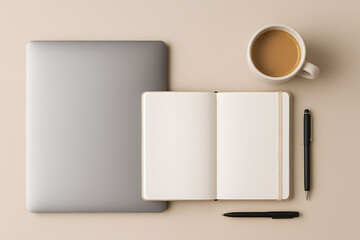 Minimal workspace flat lay with laptop, open notebook and coffee cup
