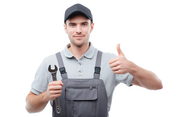 Confident Mechanic: A skilled mechanic, dressed in professional attire, offers a thumbs-up gesture, holding a wrench, exuding confidence in his expertise.