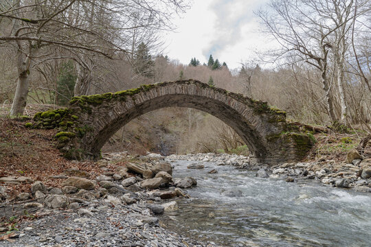 Old stone arch bridge in Ligurian Alps mountains, Mendatica municipality, Imperia province, Italy