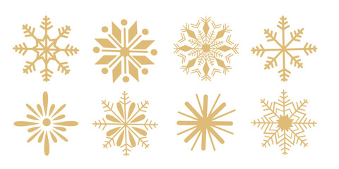 A collection of eight different gold snowflake designs  on a white background. Festive seasonal symbols for Christmas and New Year decoration
