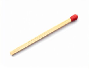 Single wooden matchstick with red-tipped head, placed diagonally on plain white background, sharp and minimal composition highlighting everyday object used for ignition and combustion.