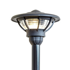 Outdoor lamp post emitting warm light against a at nighttime