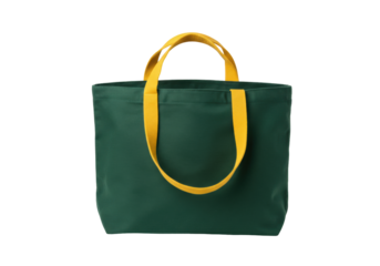 Isolated green cotton tote bag with yellow handles, blank reusable carrier for shopping