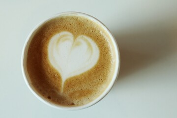 Heart latte art in coffee cup